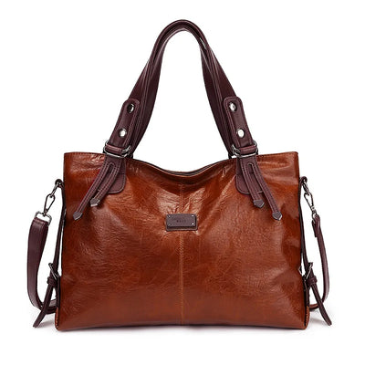 Botha™ Avery - Soft leather bag with two handles and elegant details