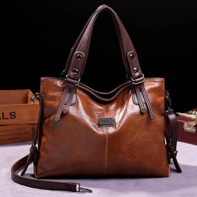 Botha™ Avery - Soft leather bag with two handles and elegant details